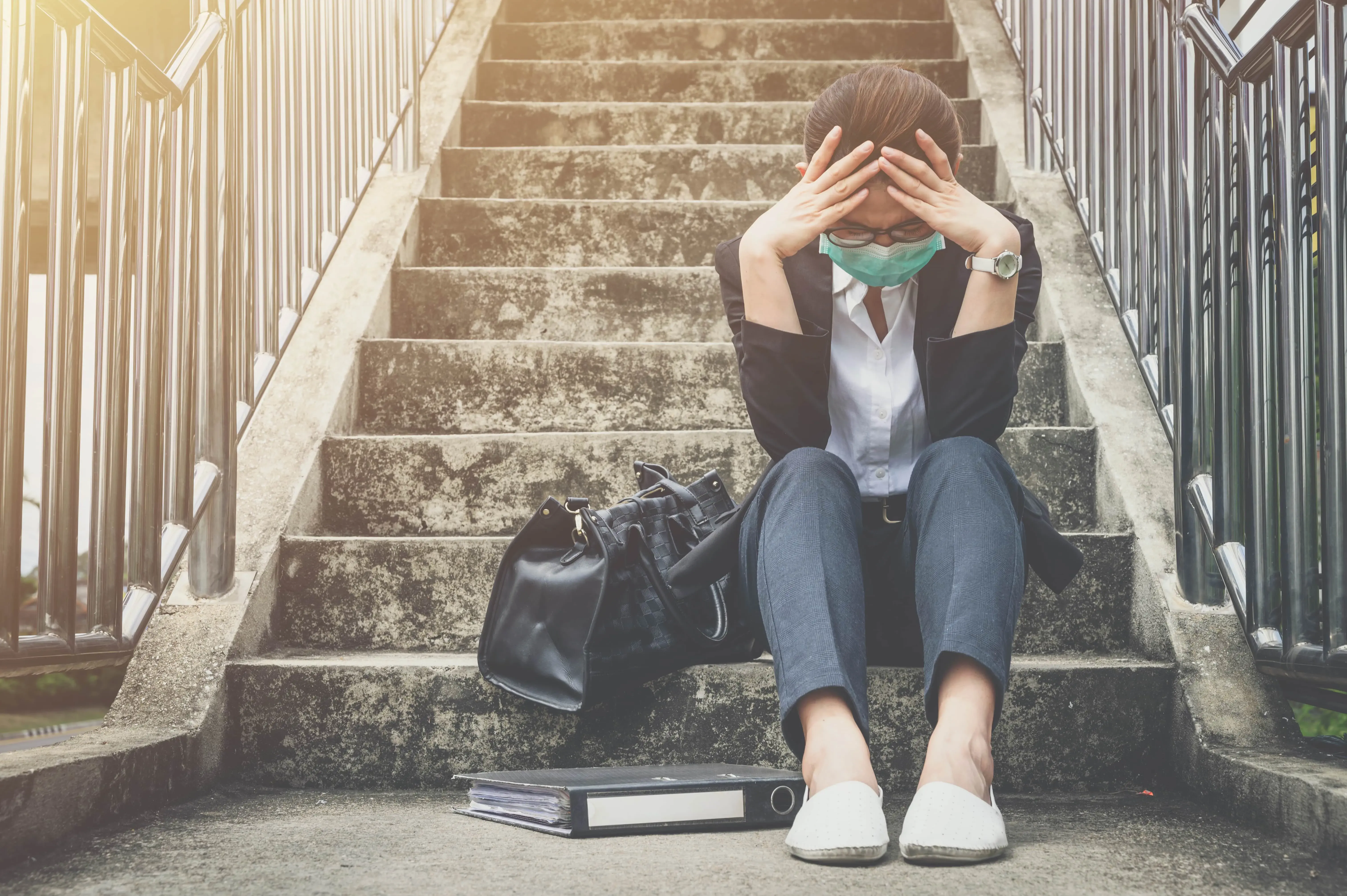 Womansittingonstairswithheaddown_2023